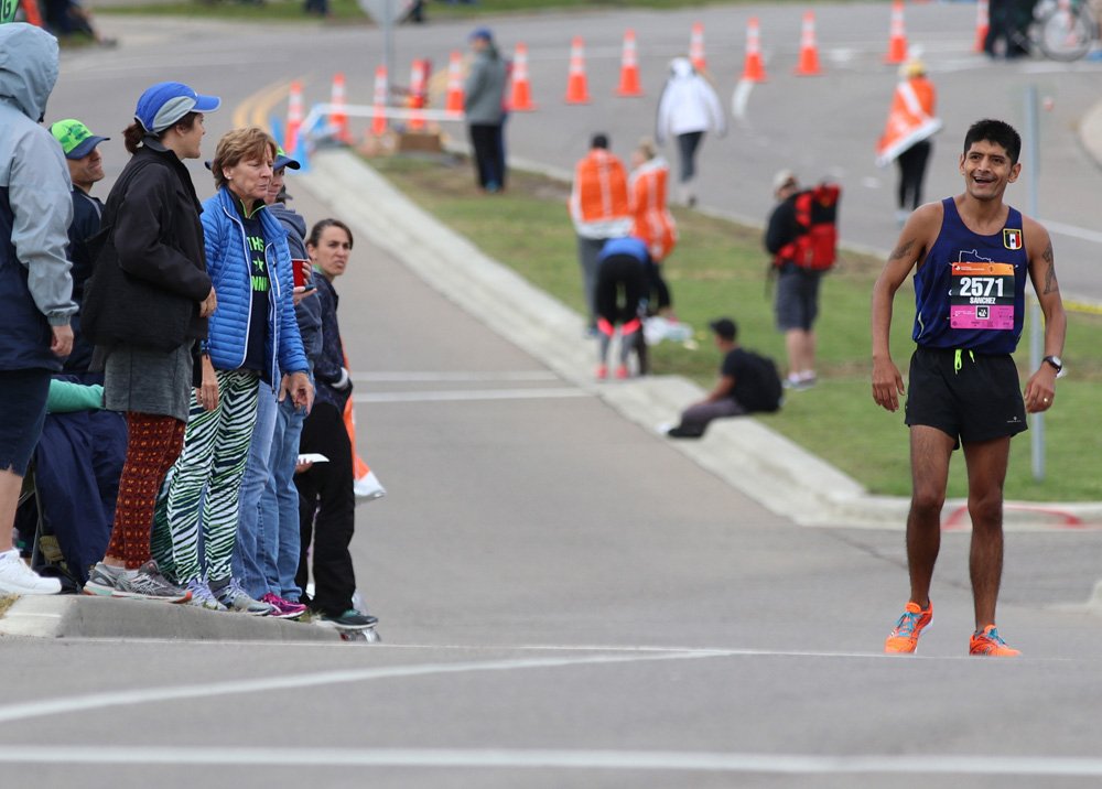 a marathon runner with a cramp